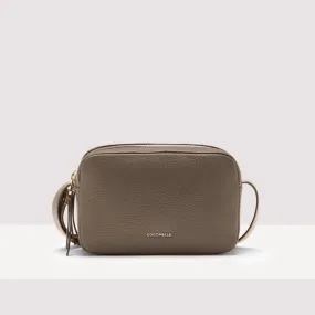 COCCINELLE GLEEN LEATHER HANDBAG IN WARM TAUPE