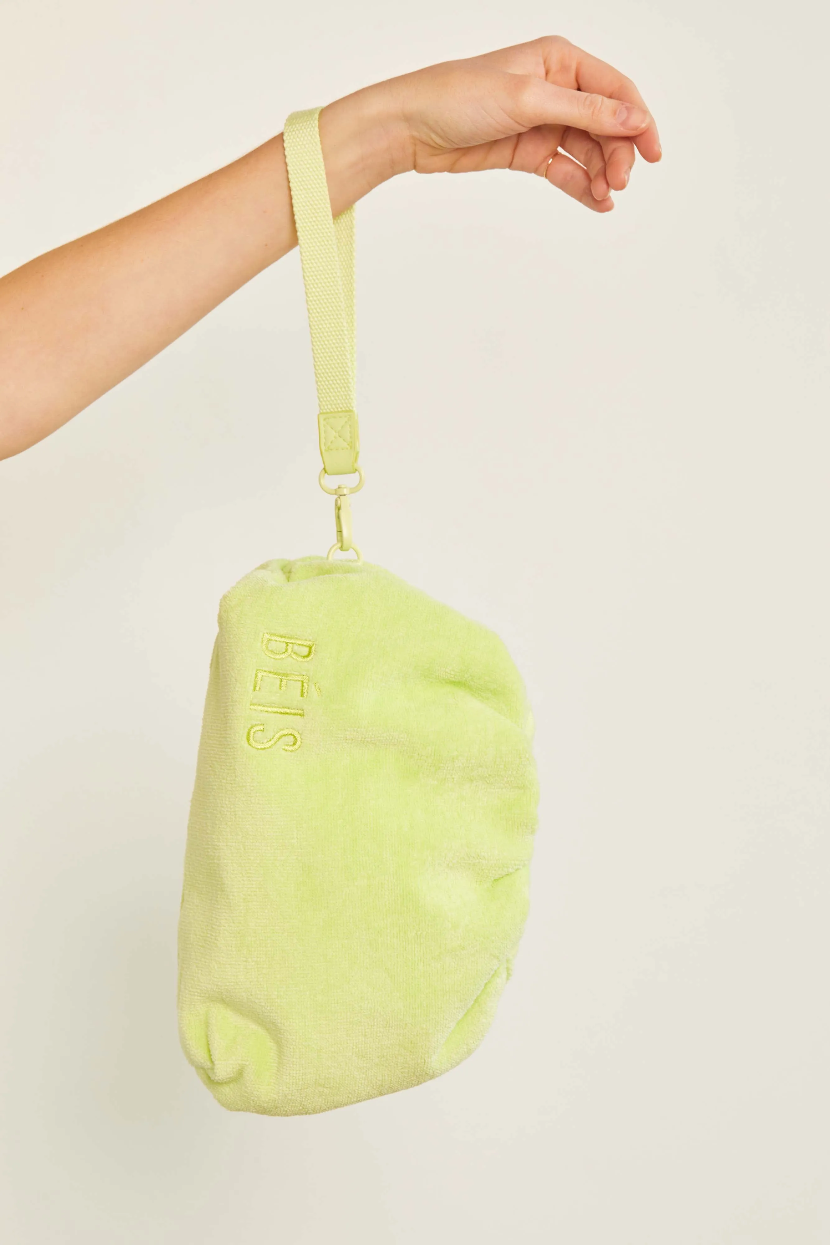 The Terry Cosmetic Clutch in Citron